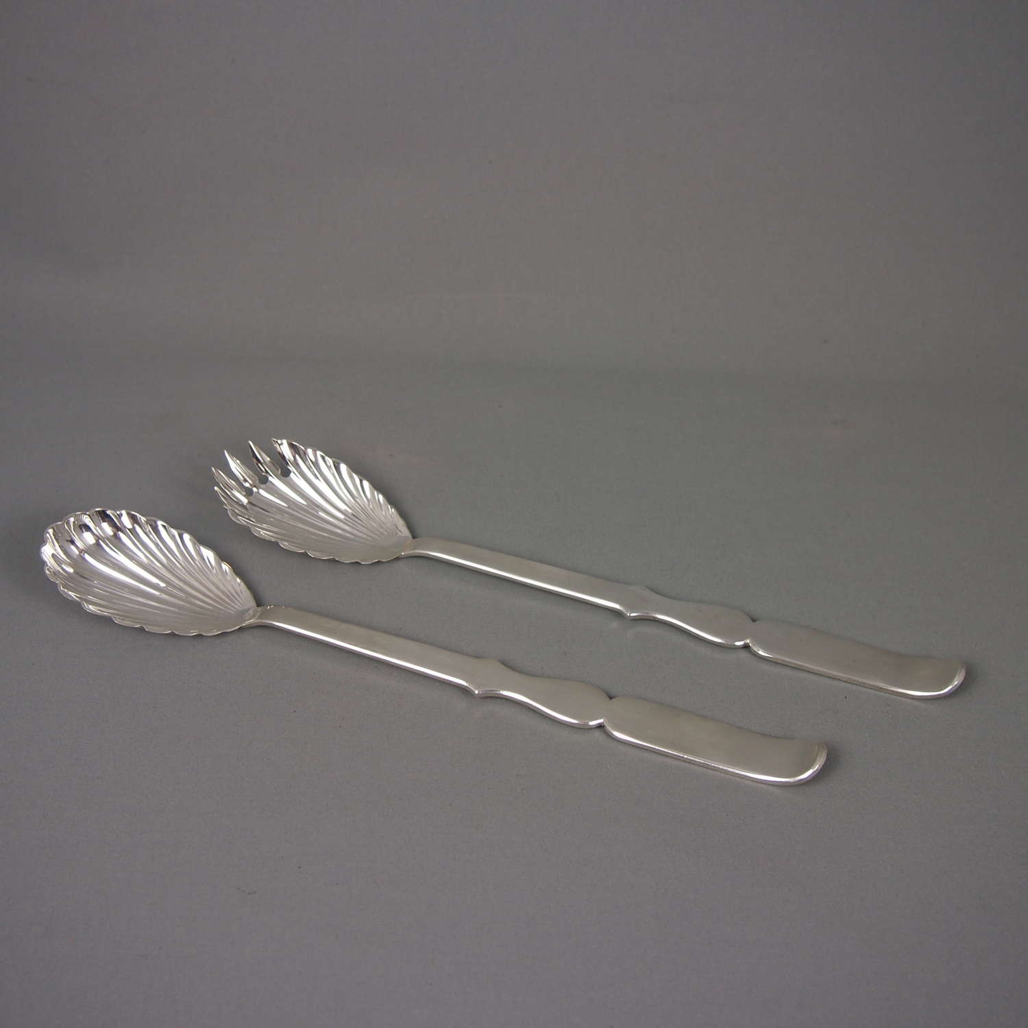 Vintage pair of silver plated fluted serving spoons. W8505
